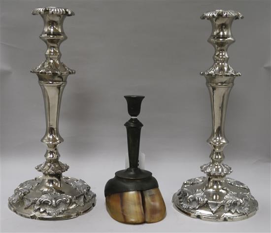 A pair of plated candlesticks and a camel hoof candlestick pair height 35cm